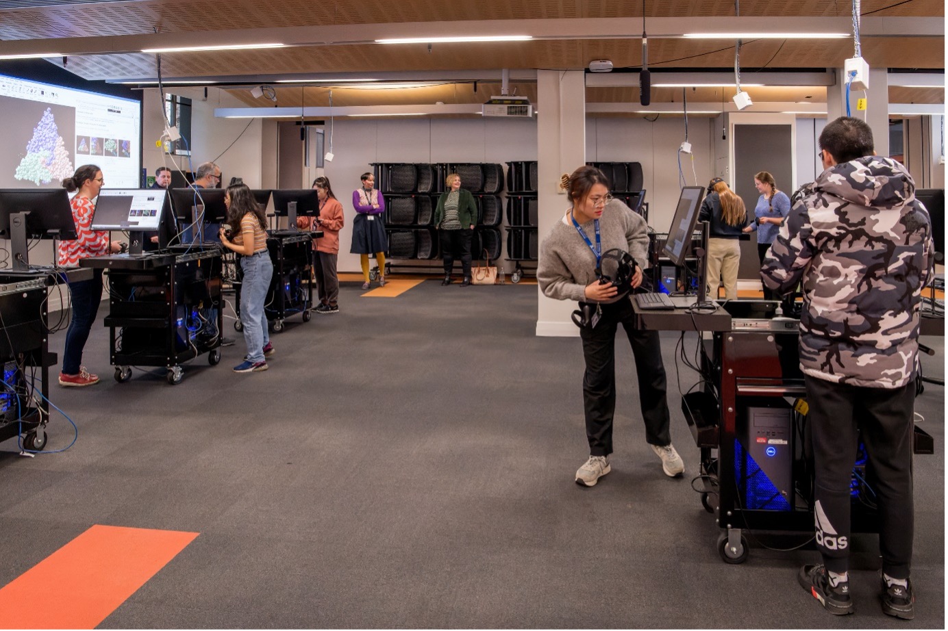 Students get ready to don headsets and explore viruses in virtual reality