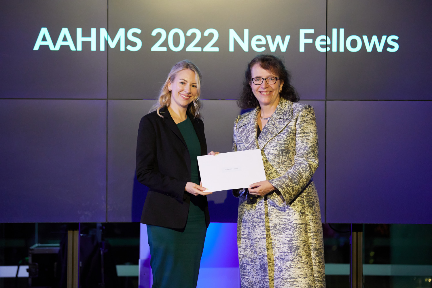 Professor Laura Mackay receiving her Fellowship at the AAHMS