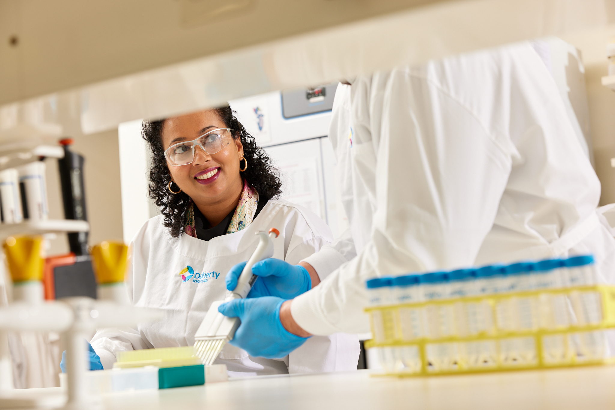 People working in the laboratory at the Doherty Institute.